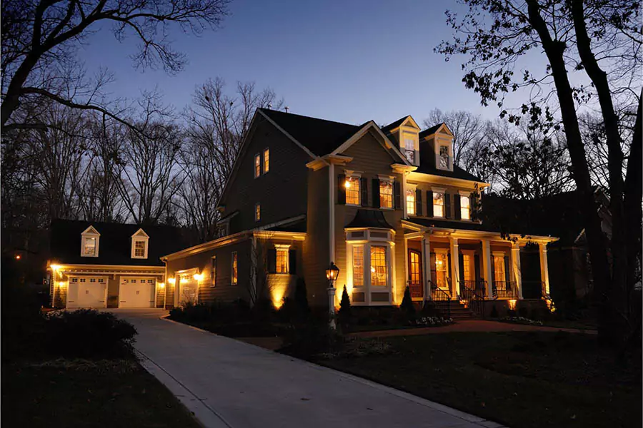 A beautiful house with a outdoor lighting systems